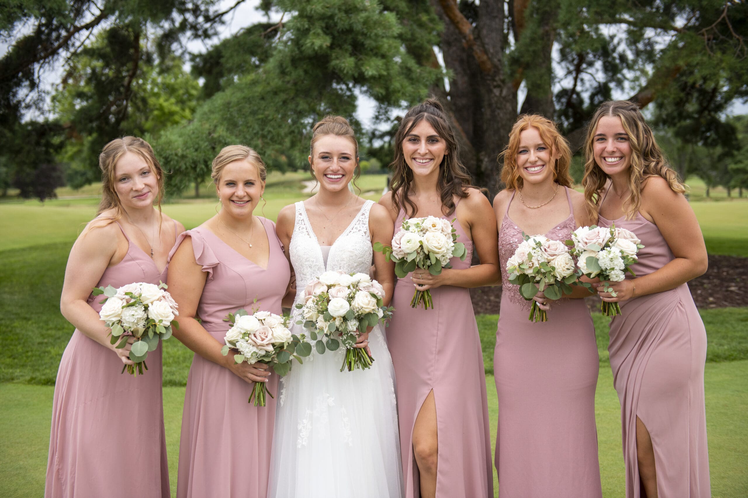 Bride with bridesmaids in Oconomowoc, WI
