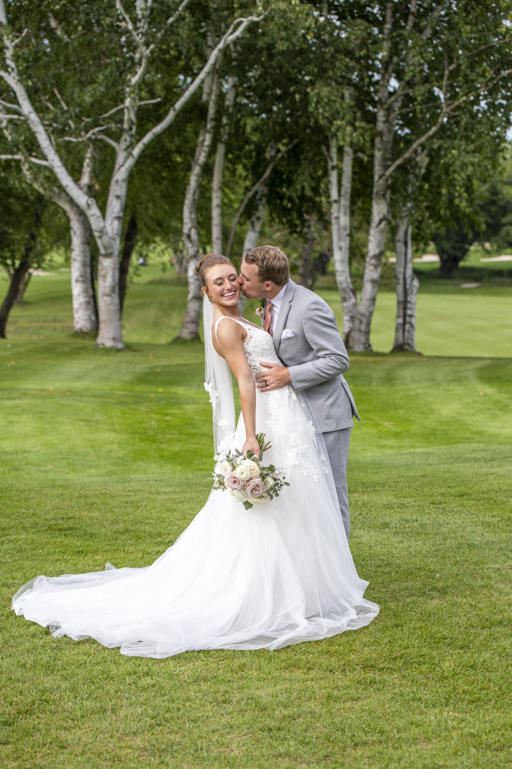 Filming a wedding couple posing in Oconomowoc, WI. 