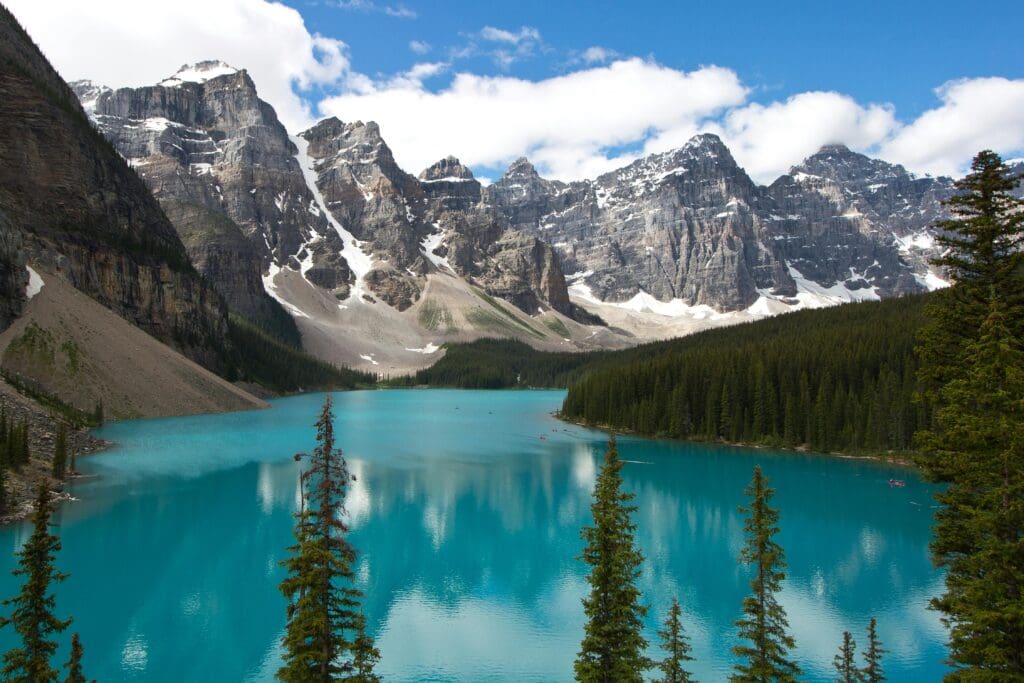 Moraine Lake in Banff National Park with turquoise water and dramatic mountain peaks, a popular elopement and wedding location